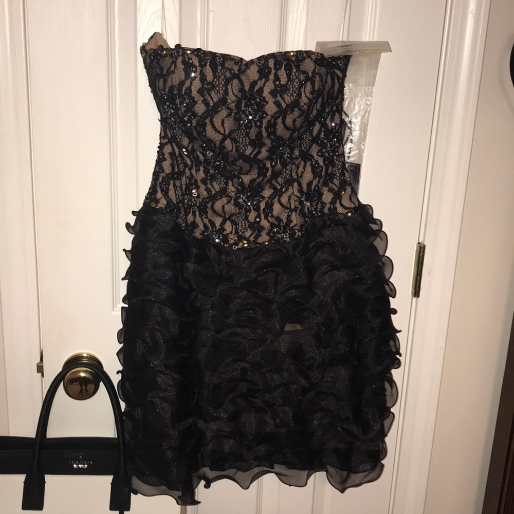 Strapless black & cream dress with beading detail!